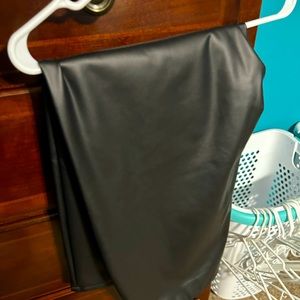 Last Chance Donating next week. Leather like pull on pants. Size 22. worn once.